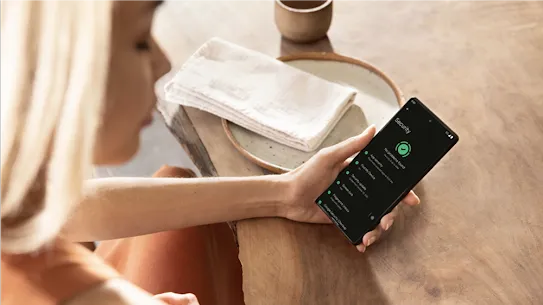 Two people with a Pixel phone