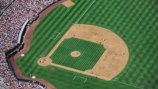 Aerial view of a baseball diamond with fans in the stands
