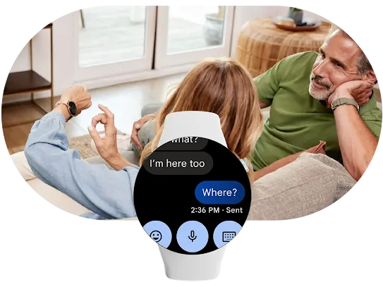 In the foreground, a smartwatch with the message “Hey! You want to grab coffee?” on Google Messages. Behind it, two people sit while one taps their watch.
